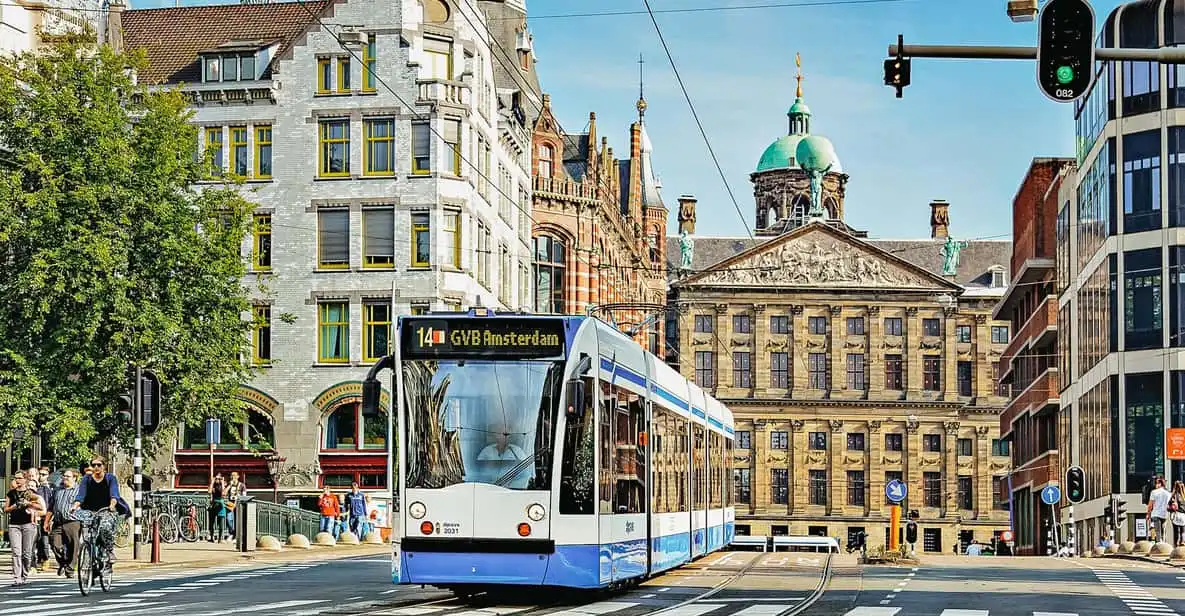 Amsterdam tram passing on a canal bridge